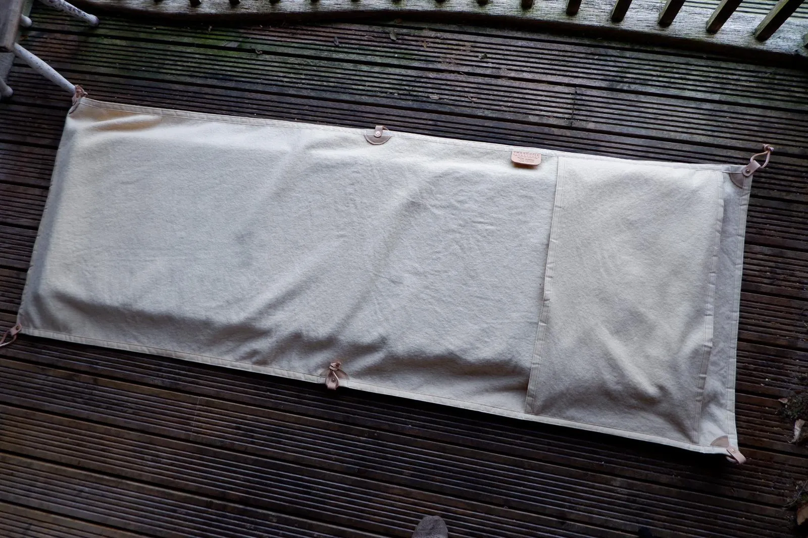 Sleeping mat cover, waxed-canvas-backed wool with leather tie-outs